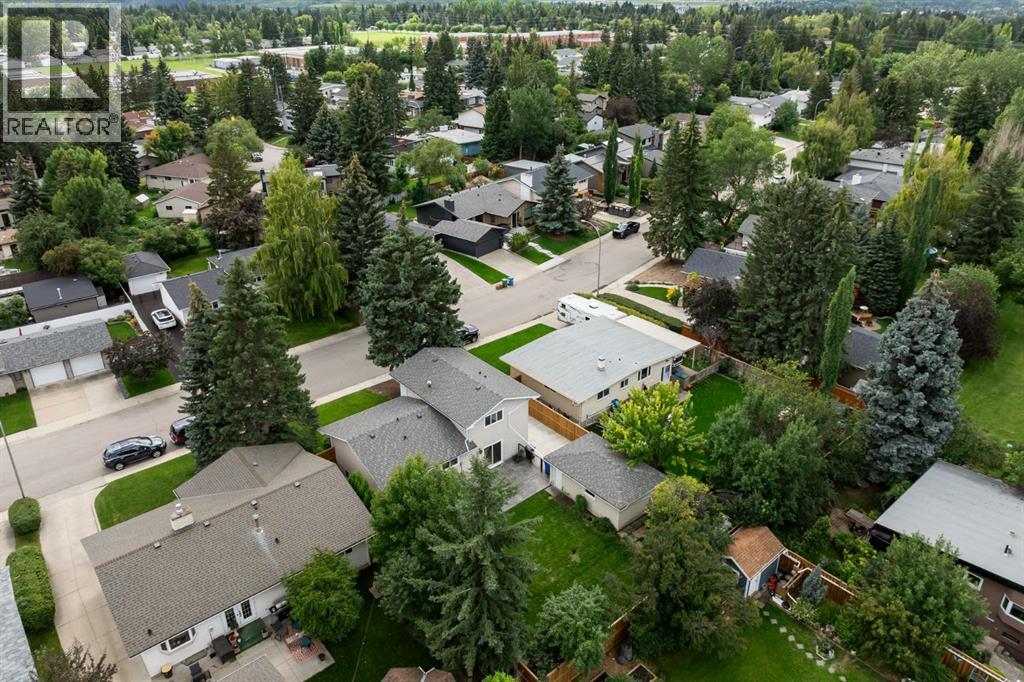 Single Family House 4 Level for Sale in  Vallance Crescent NW Varsity Calgary 