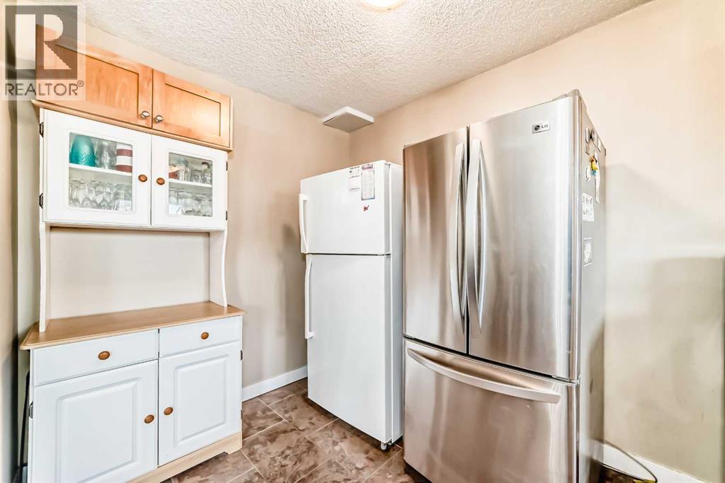 Single Family House for Sale in  Pinemill Mews NE Pineridge Calgary 