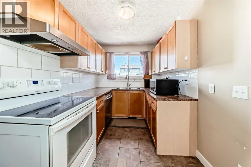 Single Family House for Sale in  Pinemill Mews NE Pineridge Calgary 