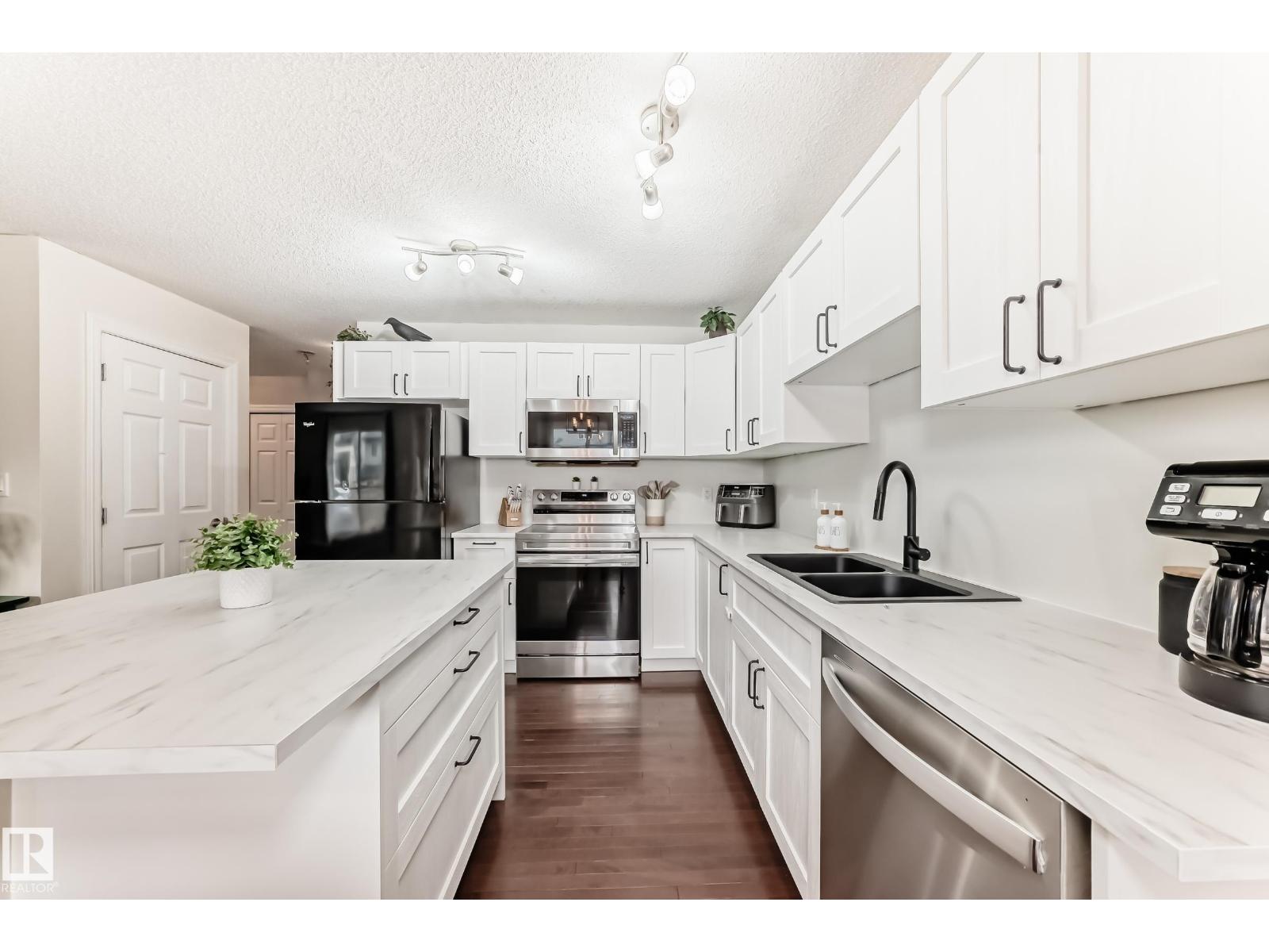 Photo 4 of 106 Rue Monique, Beaumont AB