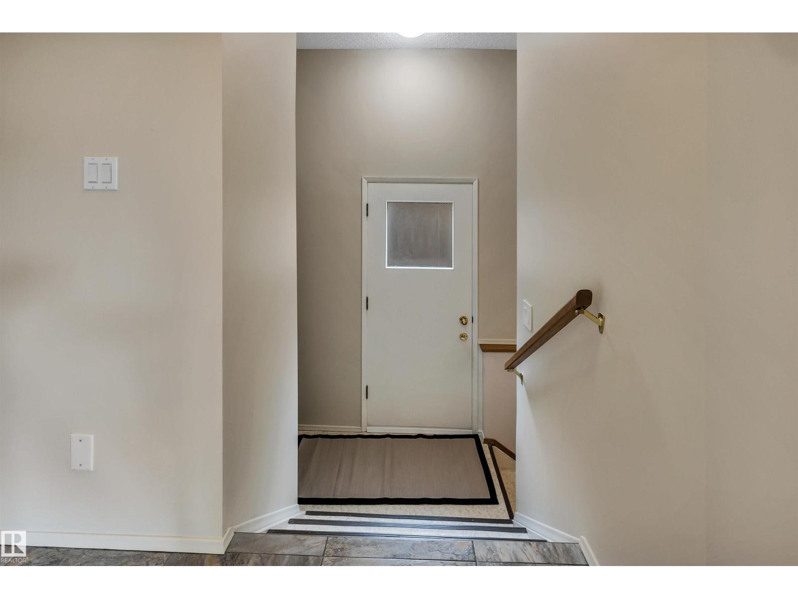 Photo 1 of 8212 Rowland Rd Nw, Edmonton AB