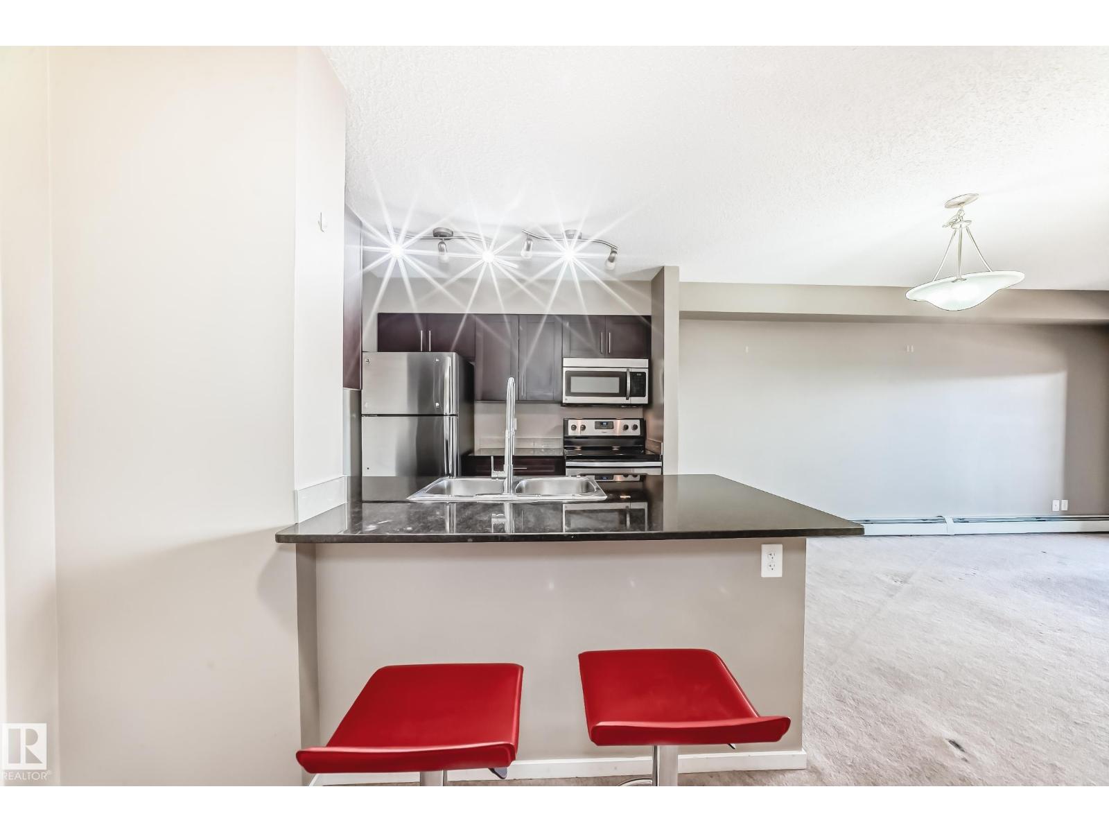 Photo 1 of 418 3315 James Mowatt Tr Sw, Edmonton AB