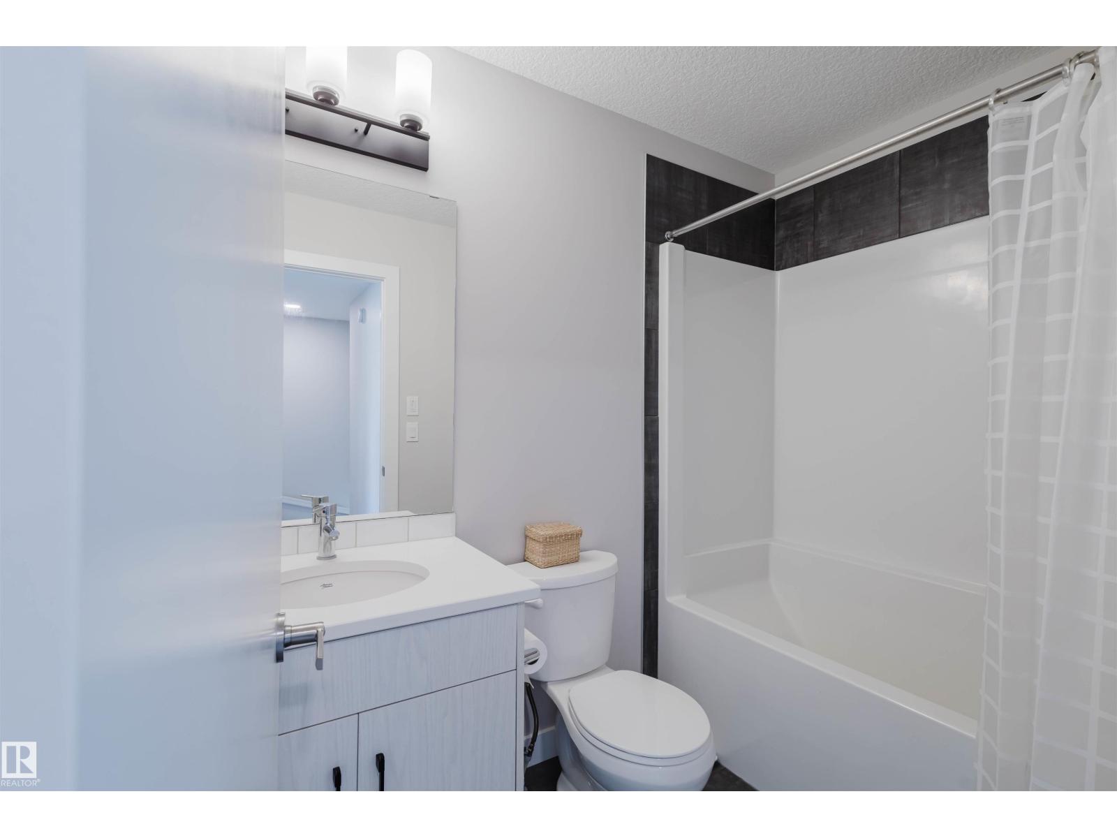 Photo 35 of 18 11373 12 Av Nw, Edmonton AB