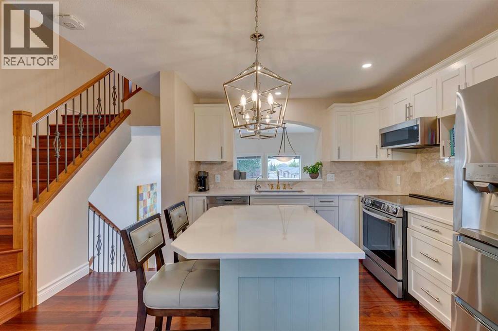 Single Family House 4 Level for Sale in  Everridge Common SW Evergreen Calgary 