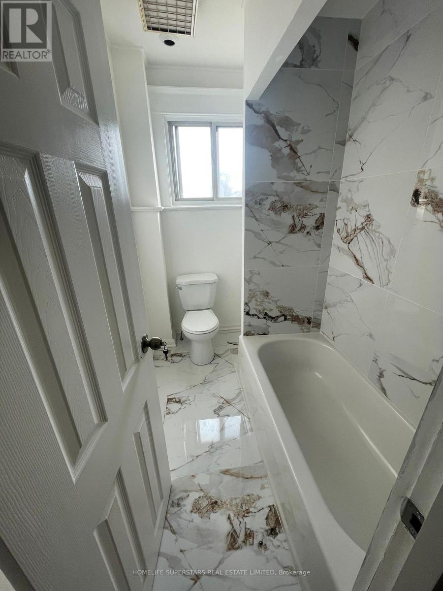 Photo 2 of 679 Danforth Avenue, Toronto ON