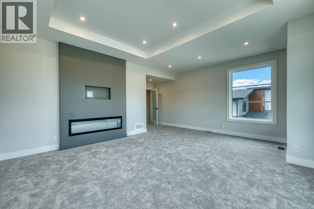Photo 11 of 925 Bull Crescent, Kelowna BC