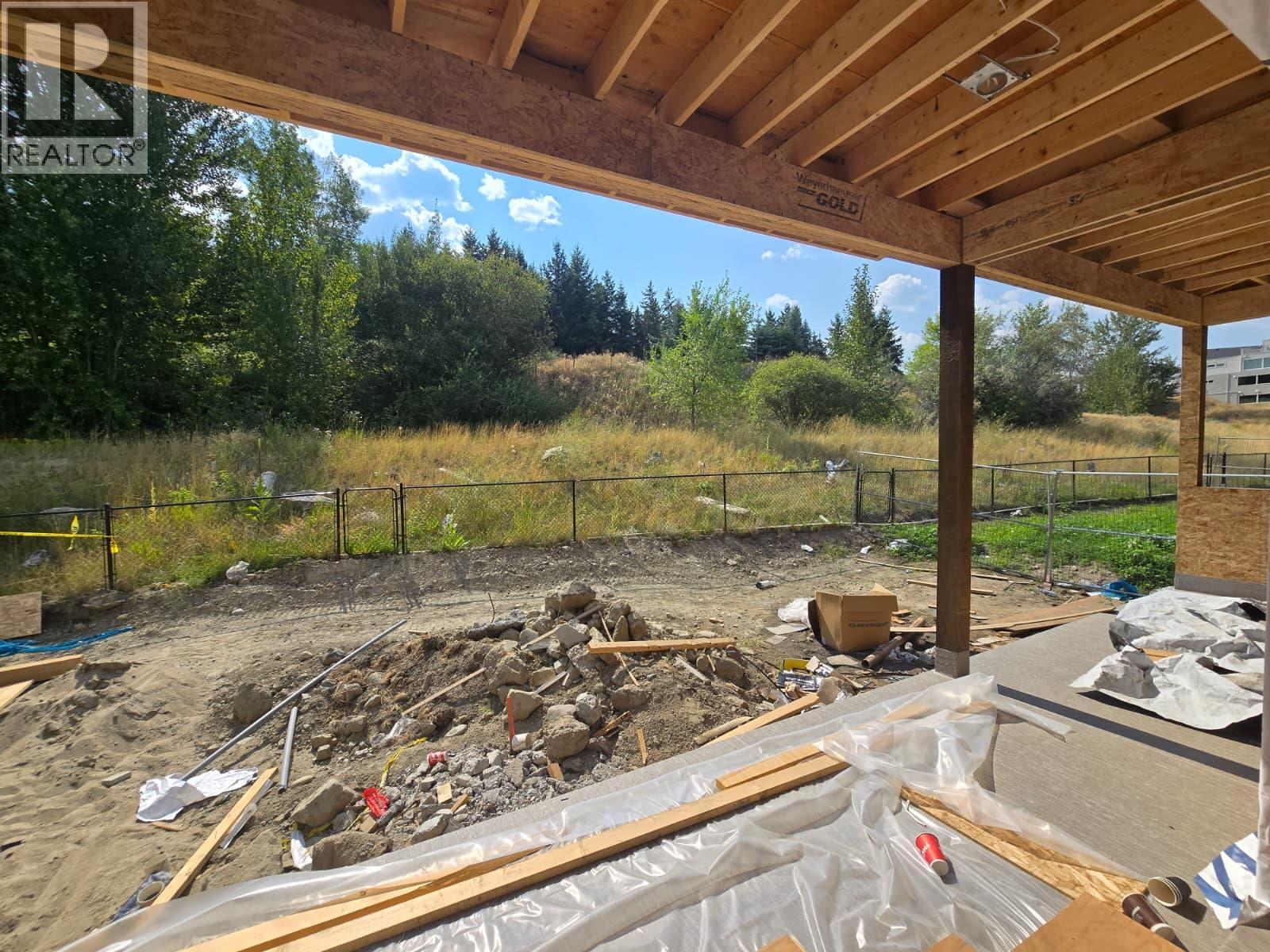 Photo 7 of 1000 Bull Crescent, Kelowna BC