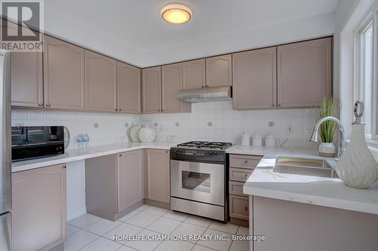 Photo 13 of 145 Raponi Circle, Toronto ON
