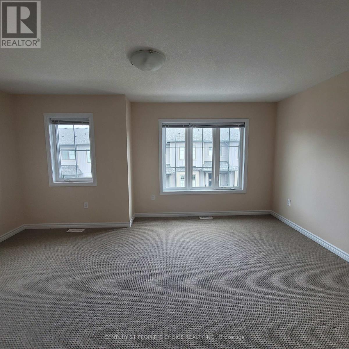 Photo 6 of 30 124 Compass Trail, Cambridge ON