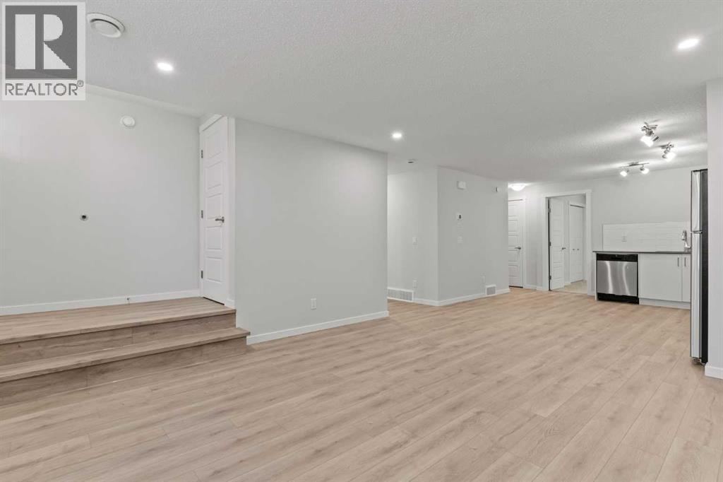 Single Family House Bungalow for Sale in  Cranbrook Square SE Cranston Calgary 