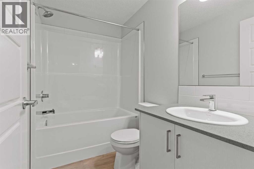 Single Family House Bungalow for Sale in  Cranbrook Square SE Cranston Calgary 