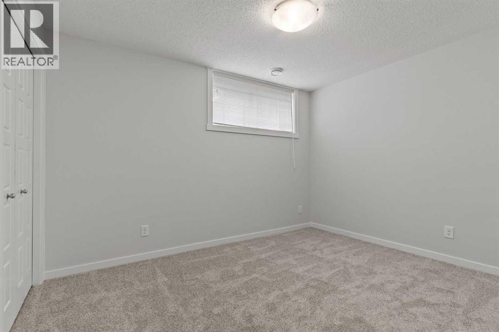 Single Family House Bungalow for Sale in  Cranbrook Square SE Cranston Calgary 