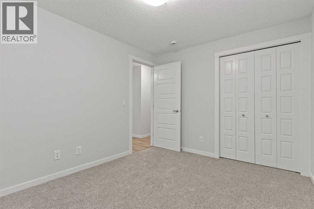 Single Family House Bungalow for Sale in  Cranbrook Square SE Cranston Calgary 