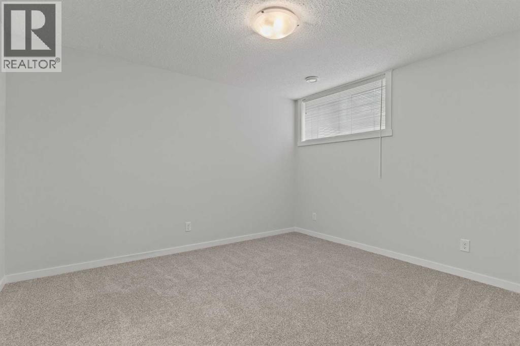 Single Family House Bungalow for Sale in  Cranbrook Square SE Cranston Calgary 
