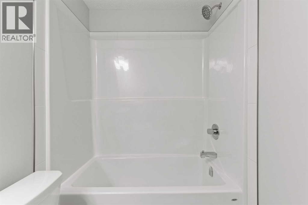 Single Family House Bungalow for Sale in  Cranbrook Square SE Cranston Calgary 