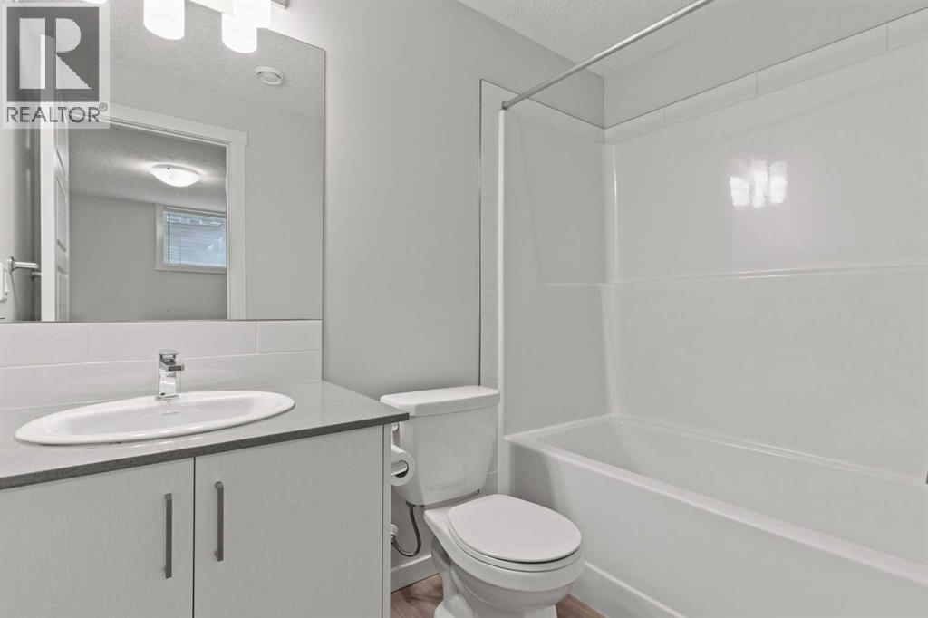 Single Family House Bungalow for Sale in  Cranbrook Square SE Cranston Calgary 