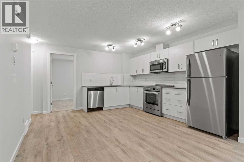 Single Family House Bungalow for Sale in  Cranbrook Square SE Cranston Calgary 
