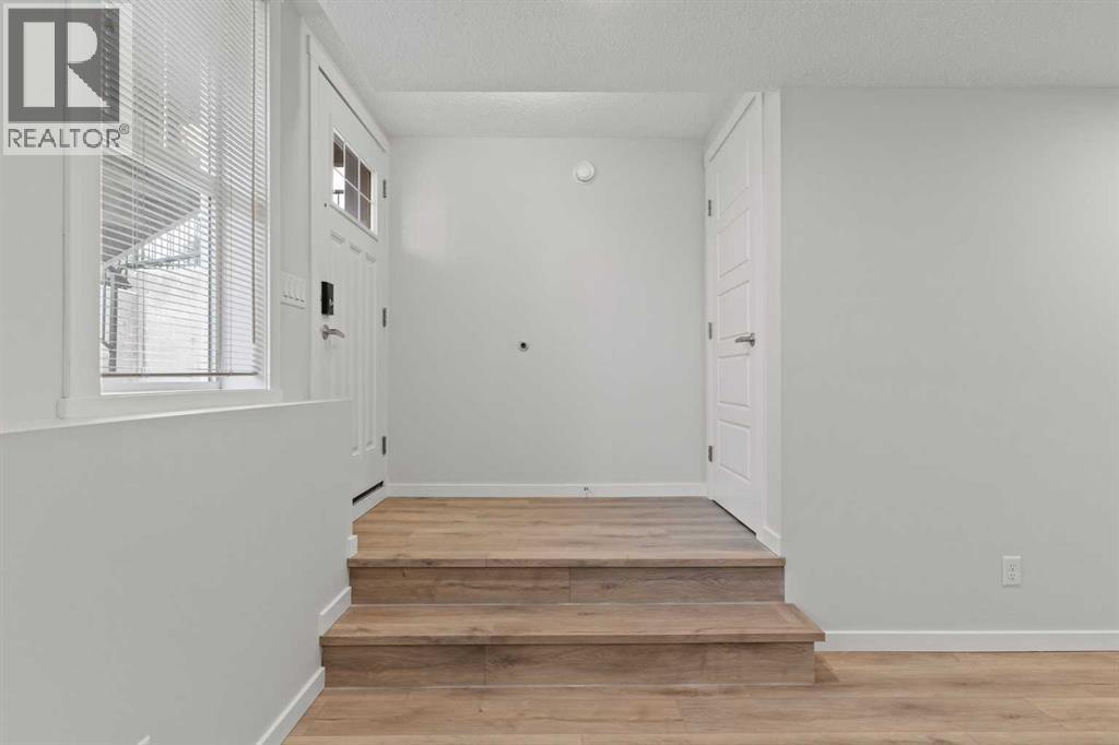 Single Family House Bungalow for Sale in  Cranbrook Square SE Cranston Calgary 