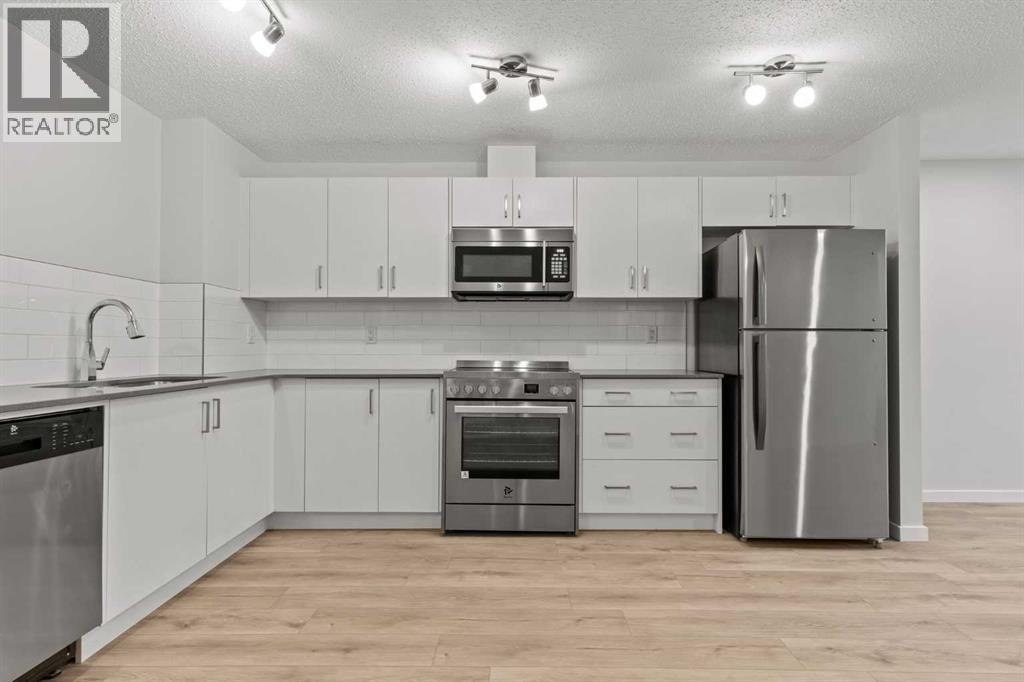 Single Family House Bungalow for Sale in  Cranbrook Square SE Cranston Calgary 