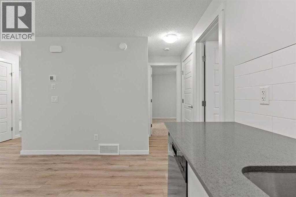 Single Family House Bungalow for Sale in  Cranbrook Square SE Cranston Calgary 