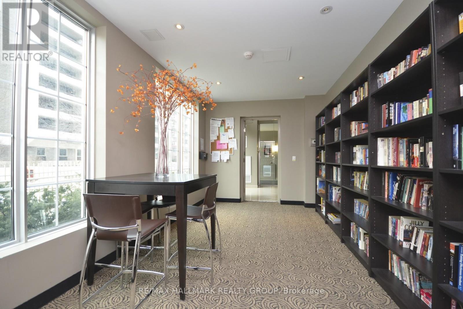 Lobby level library overlooks the front gardens.