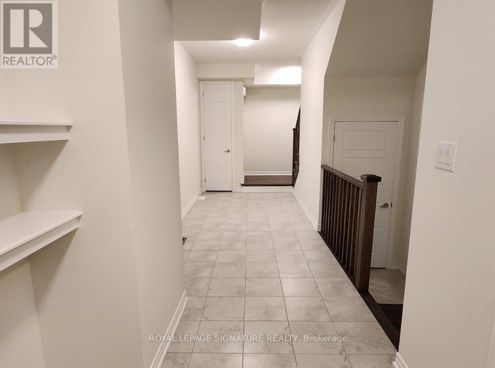 Photo 5 of 114 Thomas Frisby Jr Crescent, Markham ON