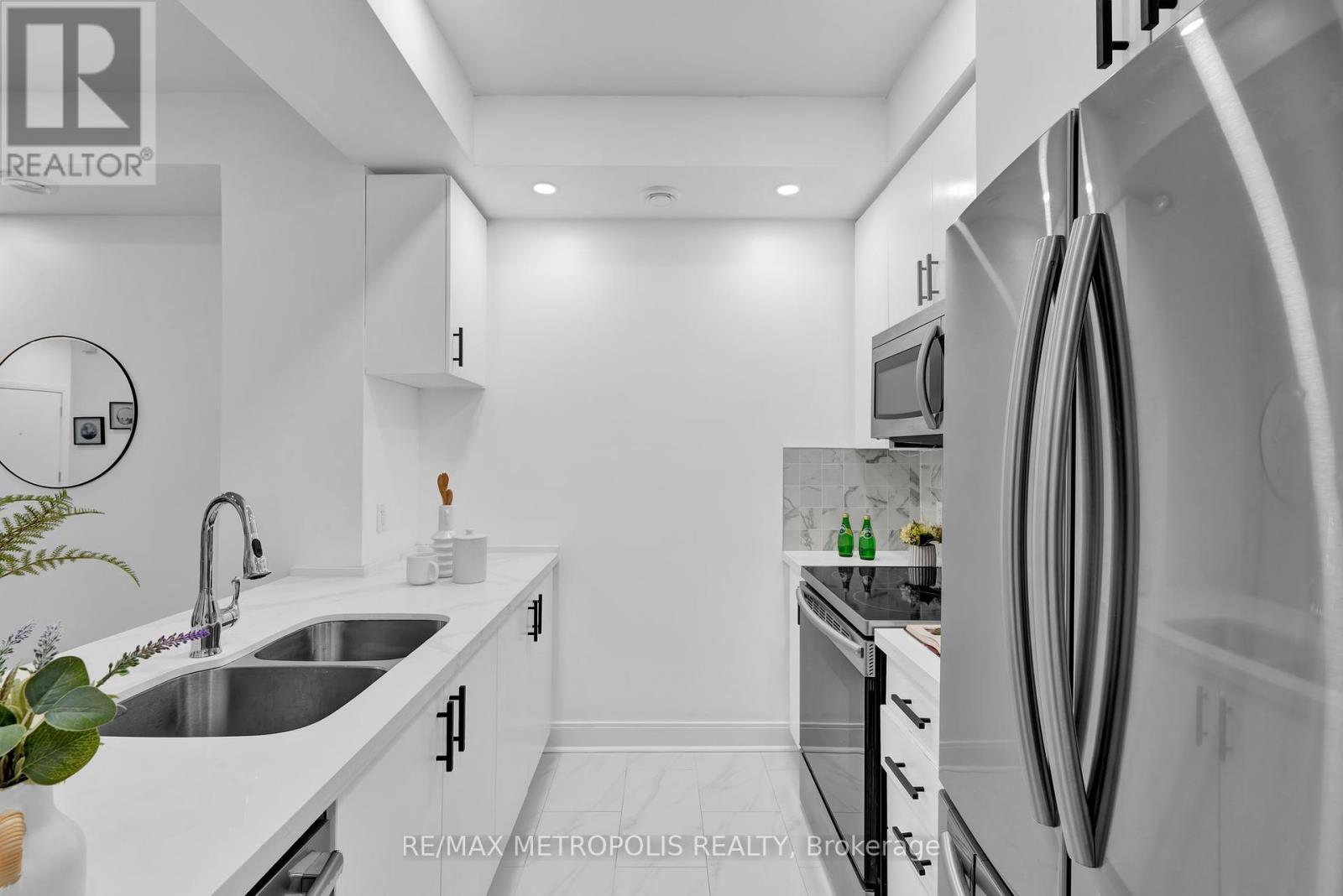 Photo 50 of Th 55 295 Village Green Square, Toronto ON