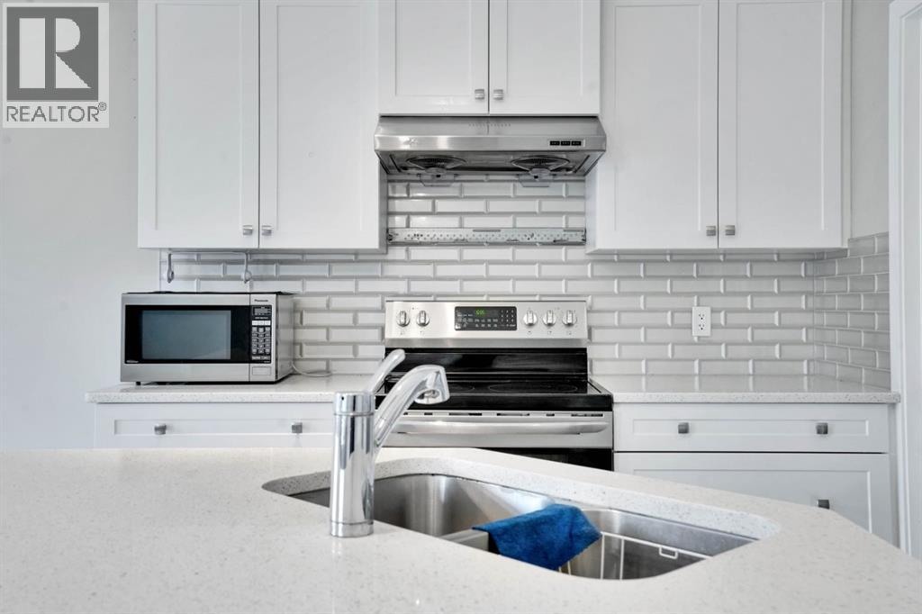 Photo 5 of 21 Kingsbury Close Se, Airdrie AB