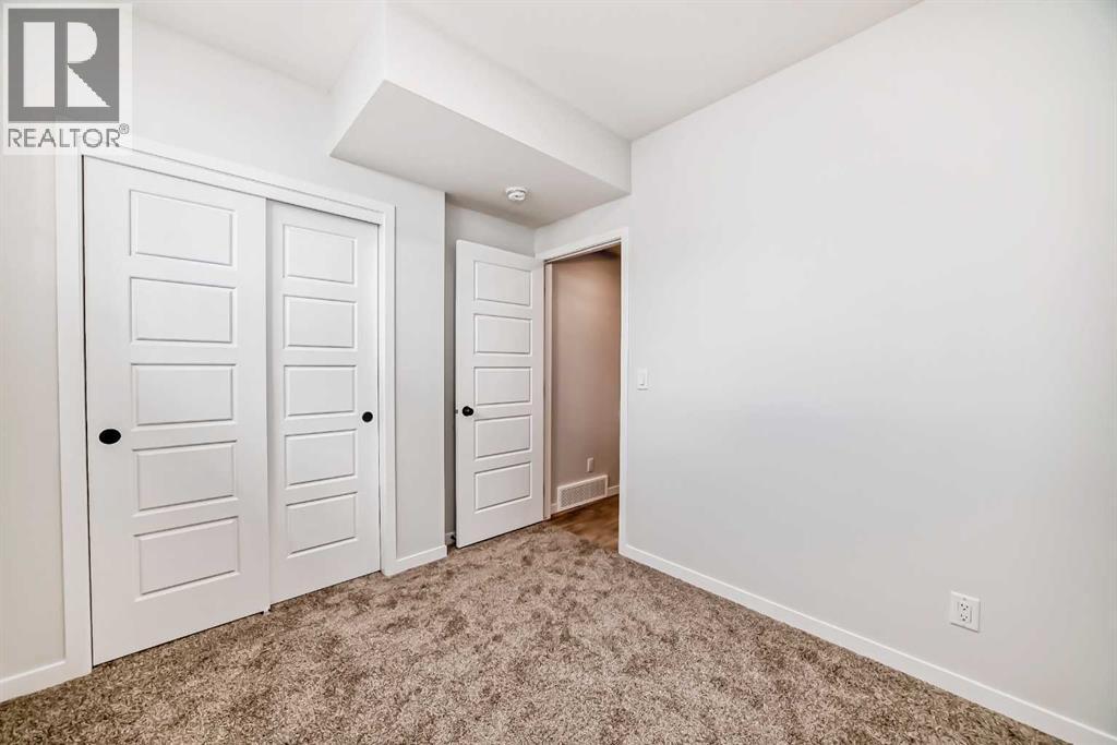 Photo 22 of 153 Edith Way Nw, Calgary AB