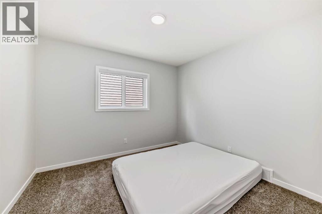 Photo 14 of 153 Edith Way Nw, Calgary AB