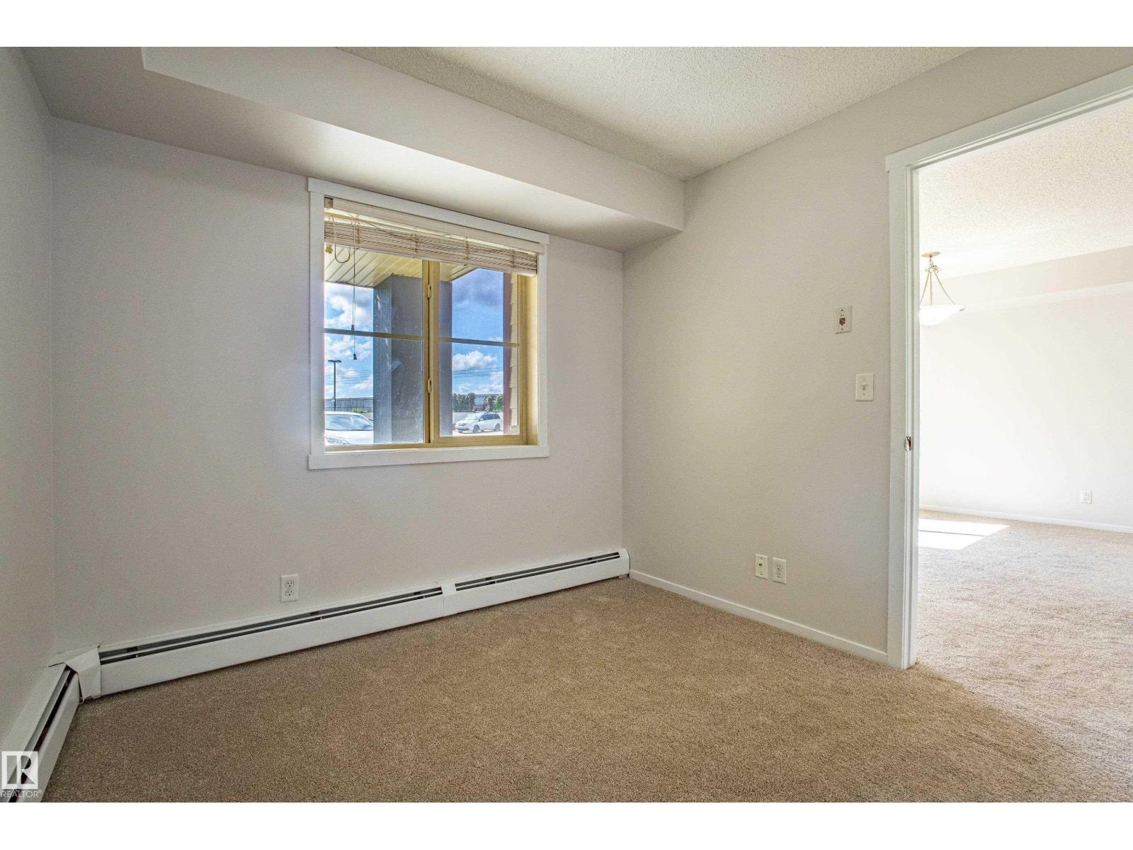 Photo 9 of 108 5810 Mullen Pl Nw, Edmonton AB