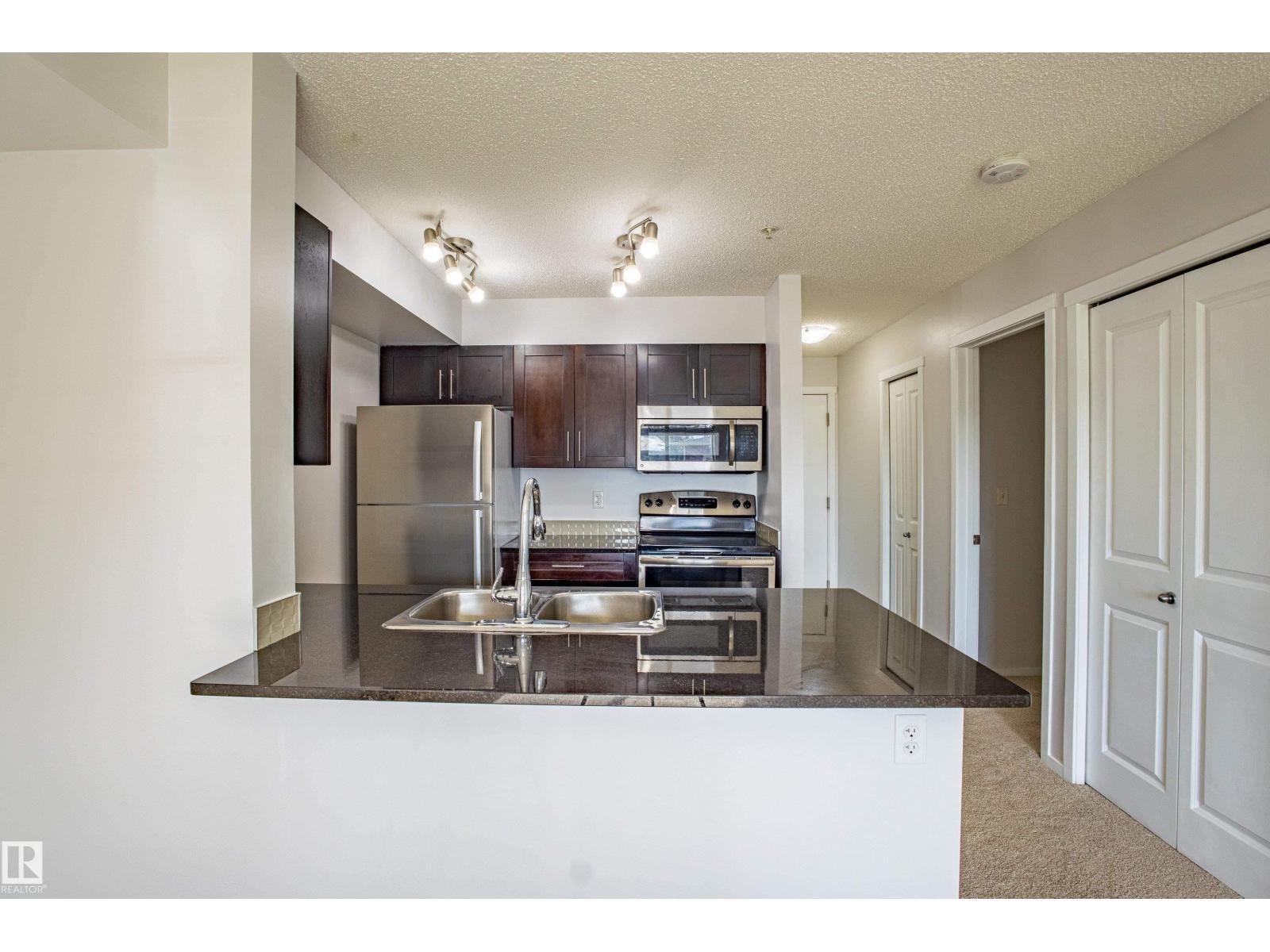 Photo 32 of 108 5810 Mullen Pl Nw, Edmonton AB