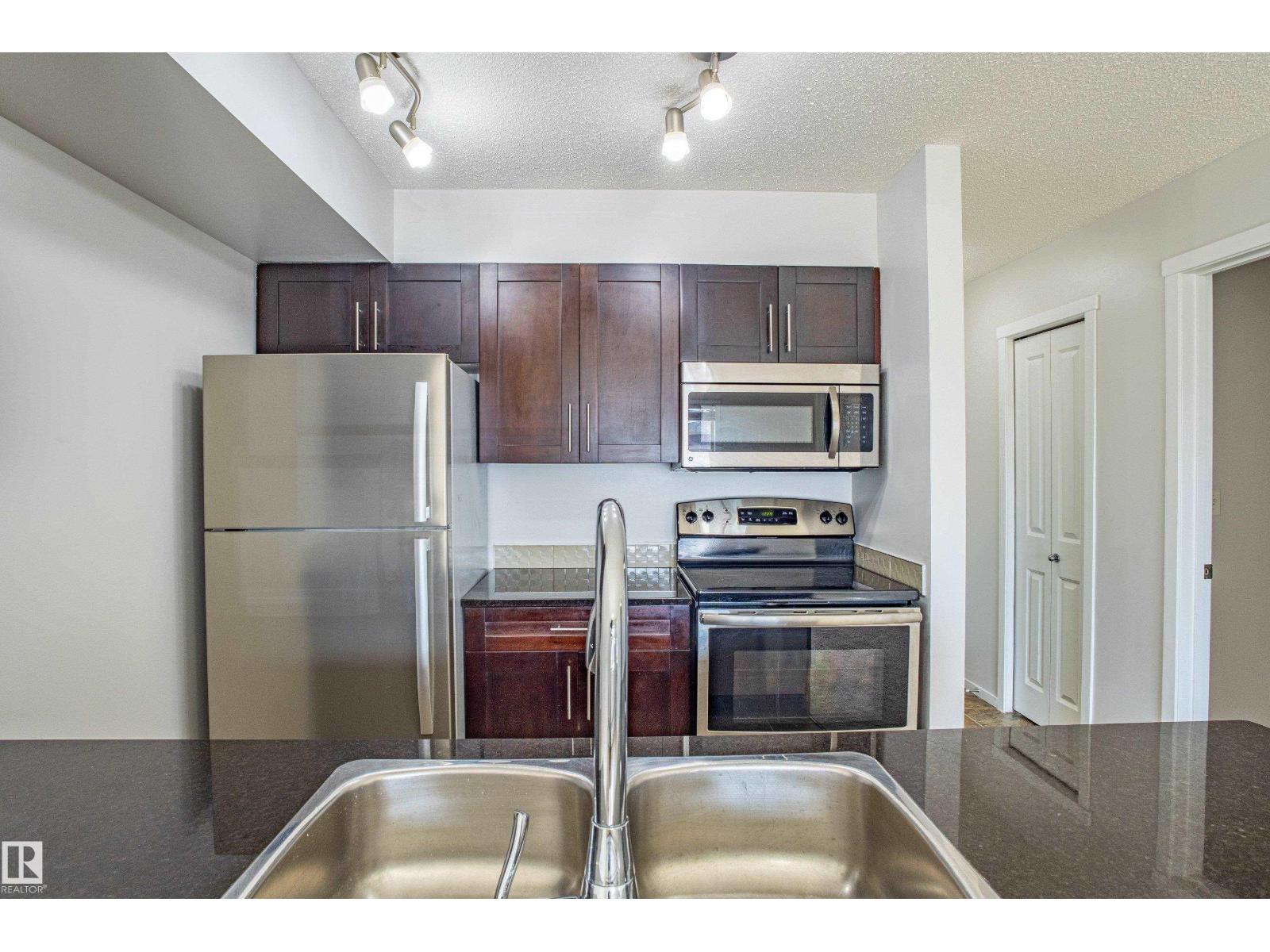 Photo 1 of 108 5810 Mullen Pl Nw, Edmonton AB