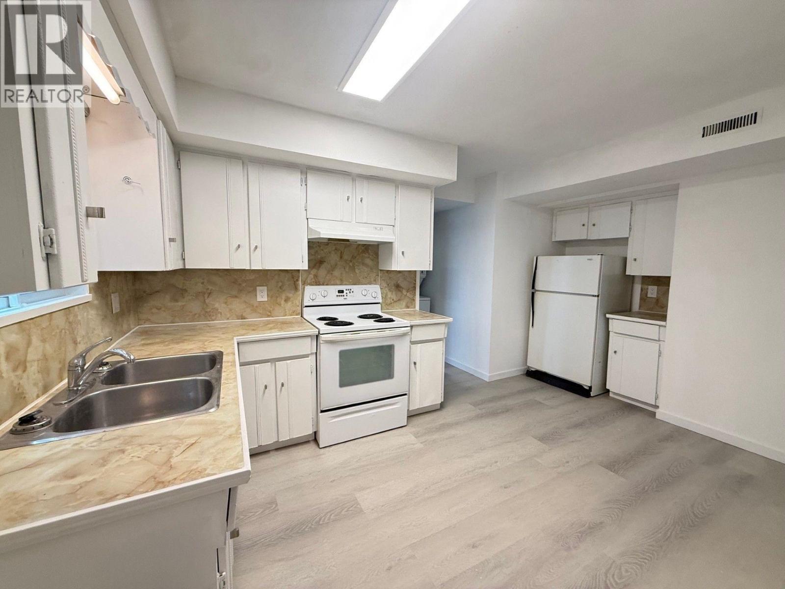 Photo 4 of Lower Level 2875 Lakewood Drive, Vancouver BC