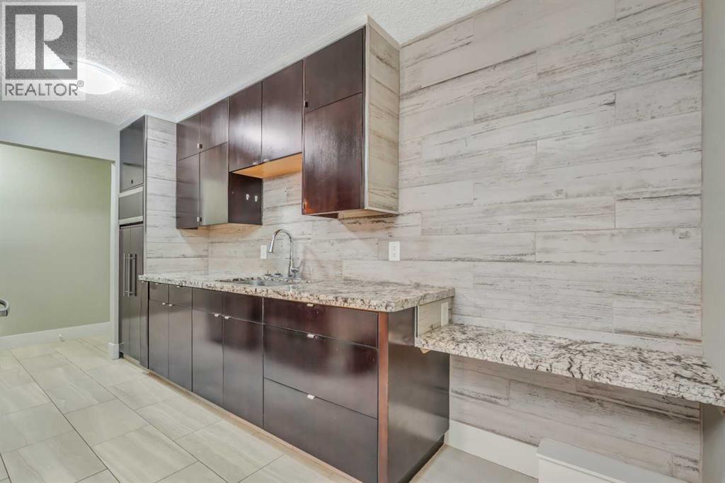 Photo 7 of 202 1919 36 Street Sw, Calgary AB