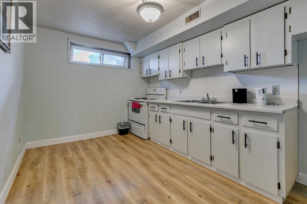 Multi-family House Bungalow for Sale in   Street SW Spruce Cliff Calgary 