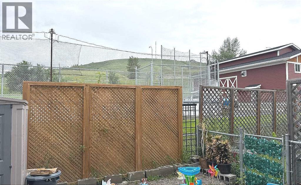 Photo 21 of 8 304 Ross Avenue, Cochrane AB
