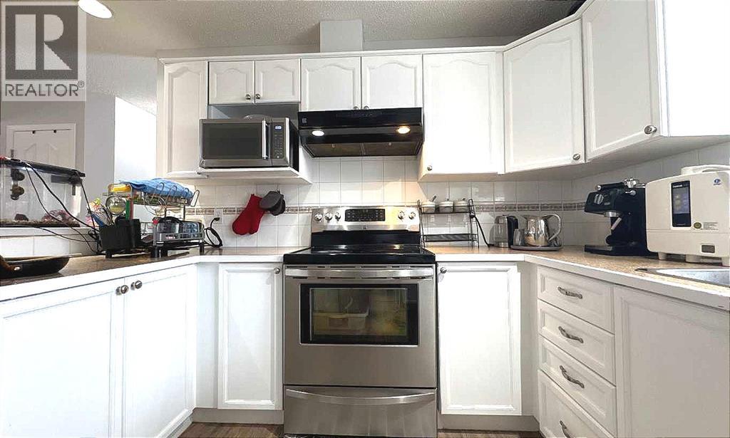 Photo 37 of 8 304 Ross Avenue, Cochrane AB