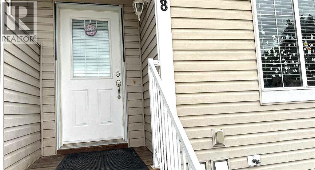 Photo 1 of 8 304 Ross Avenue, Cochrane AB
