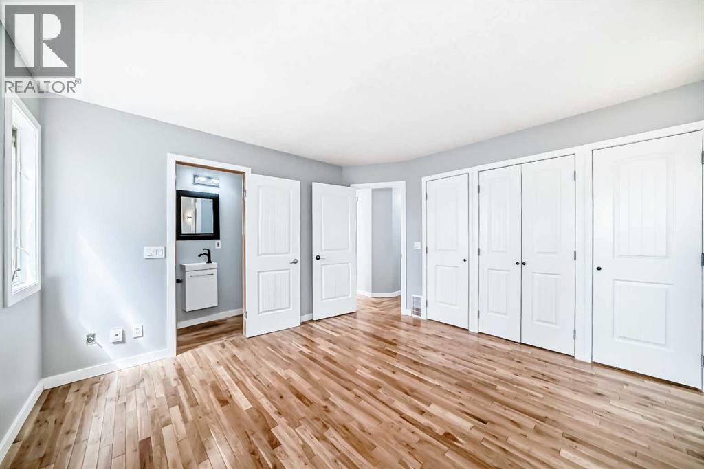 Single Family House Bi-level for Sale in  Shawfield Way SW Shawnessy Calgary 