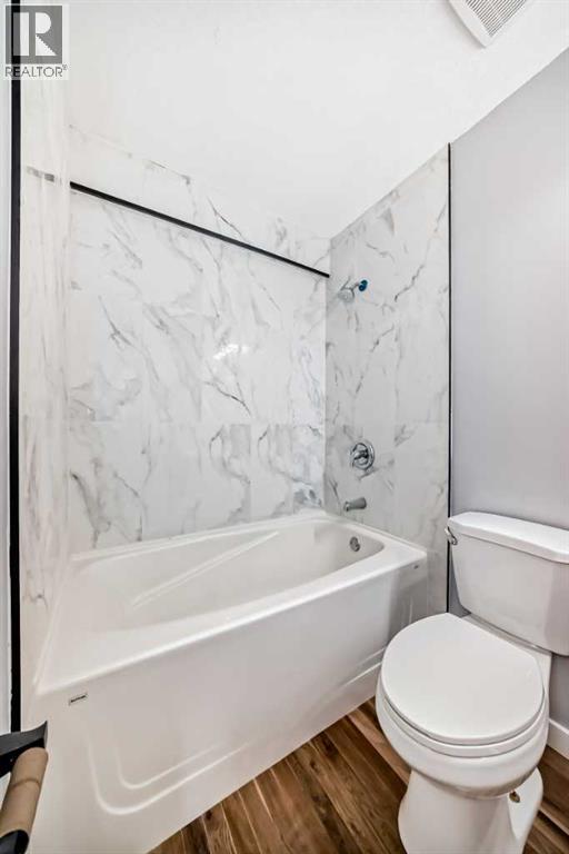 Single Family House Bi-level for Sale in  Shawfield Way SW Shawnessy Calgary 