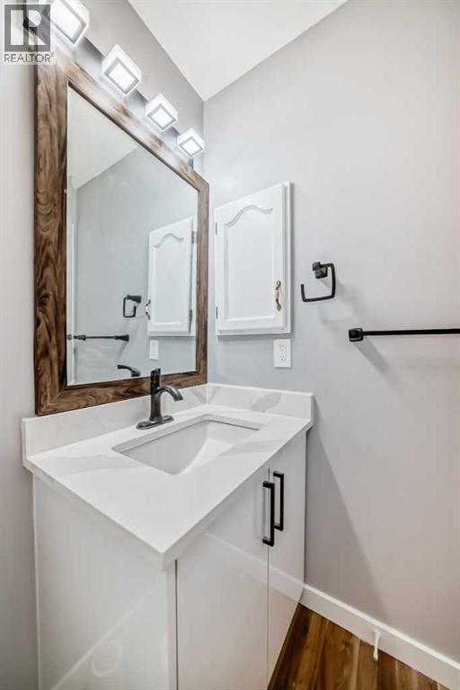 Single Family House Bi-level for Sale in  Shawfield Way SW Shawnessy Calgary 