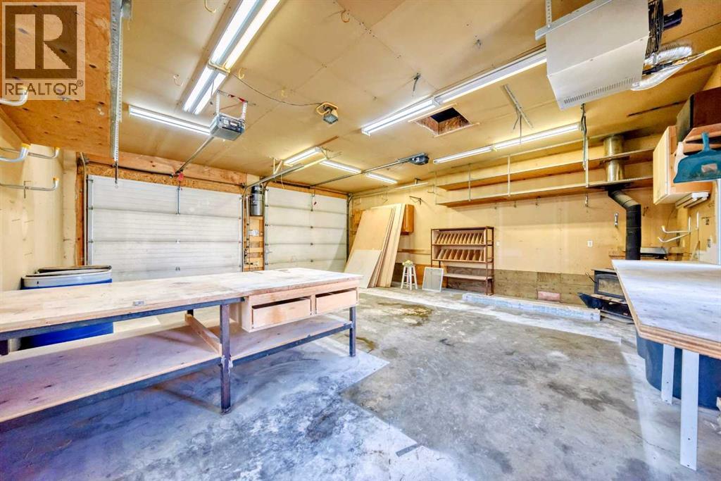 Single Family House Bi-level for Sale in  Shawfield Way SW Shawnessy Calgary 