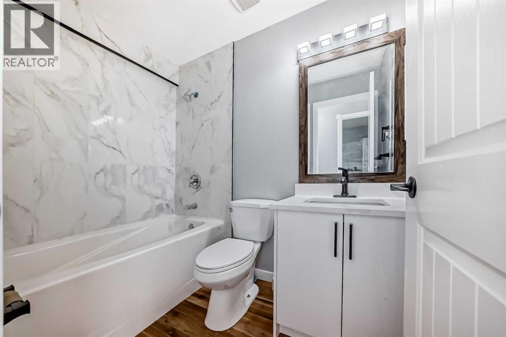 Single Family House Bi-level for Sale in  Shawfield Way SW Shawnessy Calgary 
