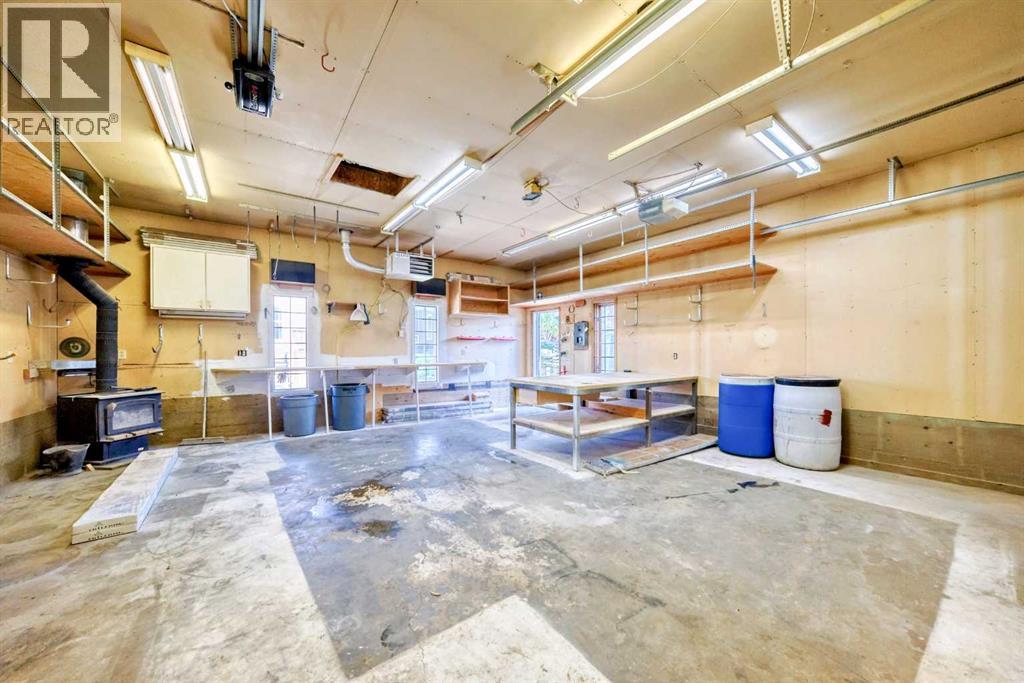 Single Family House Bi-level for Sale in  Shawfield Way SW Shawnessy Calgary 