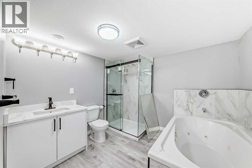 Single Family House Bi-level for Sale in  Shawfield Way SW Shawnessy Calgary 
