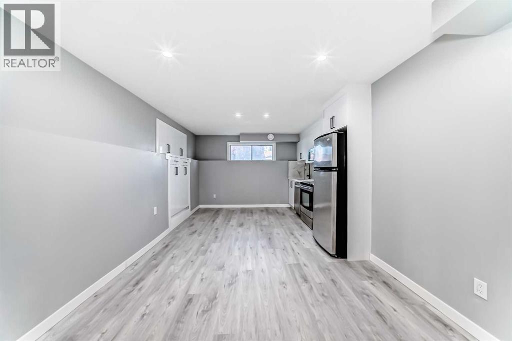 Single Family House Bi-level for Sale in  Shawfield Way SW Shawnessy Calgary 