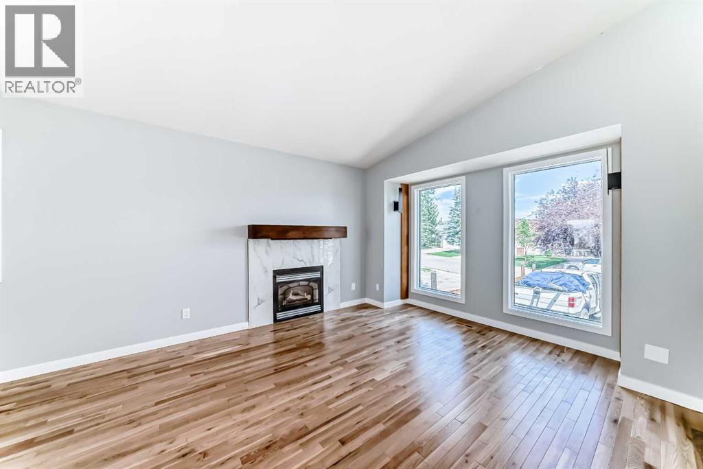 Single Family House Bi-level for Sale in  Shawfield Way SW Shawnessy Calgary 
