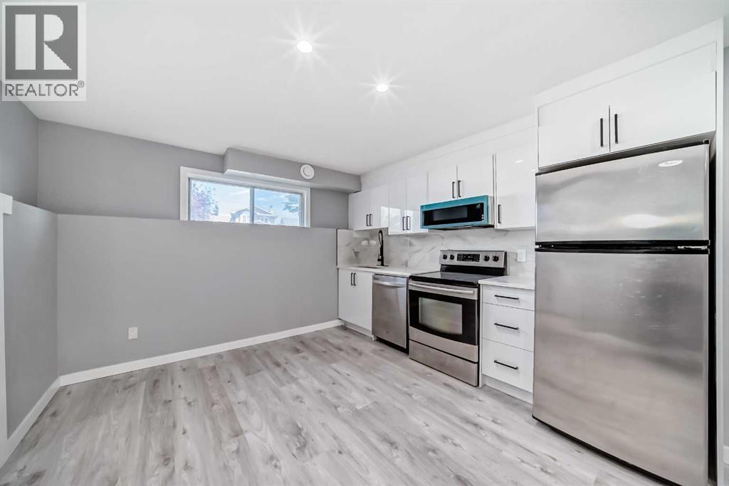 Single Family House Bi-level for Sale in  Shawfield Way SW Shawnessy Calgary 