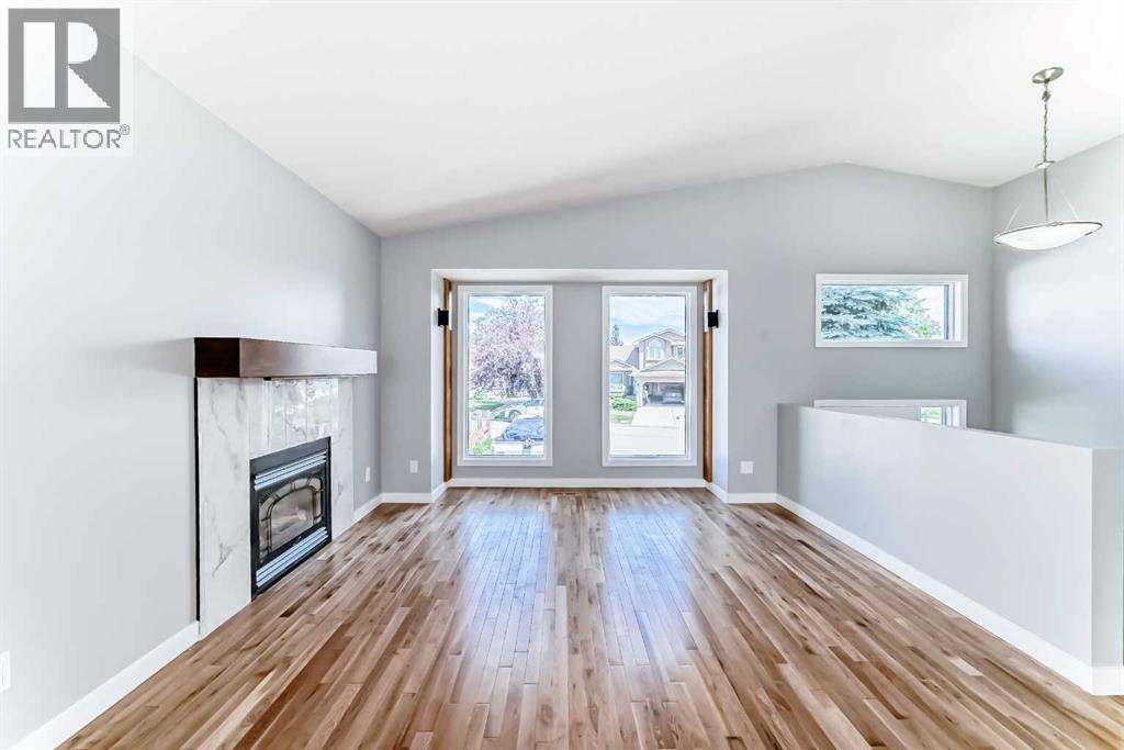 Single Family House Bi-level for Sale in  Shawfield Way SW Shawnessy Calgary 